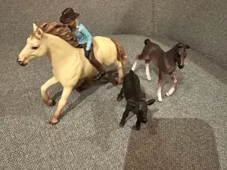 Hest m. rytter, føl og kalv