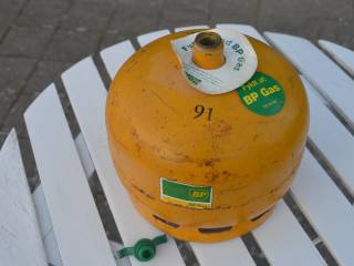 Gul gasflaske med gas