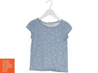 Blå bluse med blomsterprint fra H&M (str. 140)