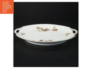 Porcelænsfad med håndtag og blomsterdekoration (str. Ø 25 cm)