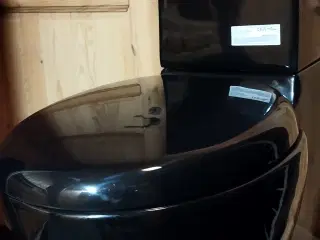 sort toilet     fejlkøb