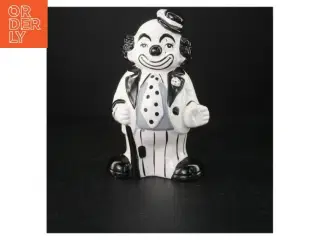 Porcelæns sparegrisformet som en klovn