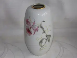 Porcelænsvase med orkide