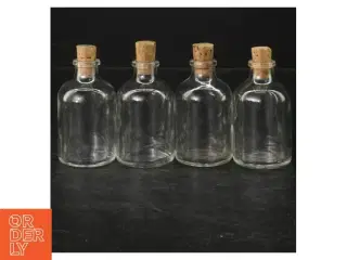 Små glasflasker med korkpropper (str. 8,5 cm)