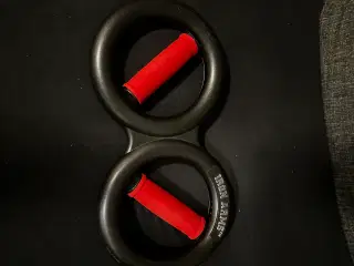 Forearms træner med fjeder modstand