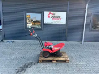 - - - Vari motor skiveslå maskine.
