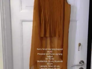 Fin top kort foran, lang bagpå