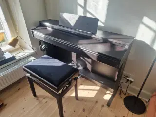 Kawai Piano med bænk og høretelefoner