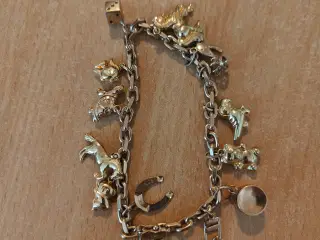 8 Karat guld armbånd med charms