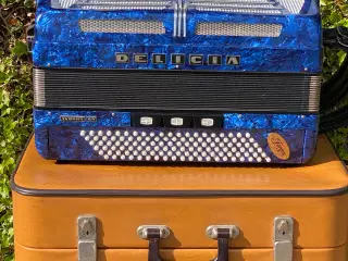 Delicia flot blå/sort Harmonika sælges 