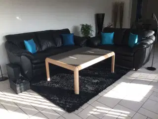 Sort 3 pers. Lædersofa.
