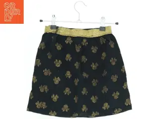 Nederdel med gyldne accenter fra Disney (str. 110)