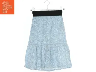 Blå nederdel med mønster fra Name It (str. 116)