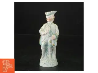 Porcelænsfigur af mand i historisk dragt