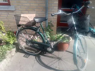 Damecykel med punkterfri dæk og indkøbskurv
