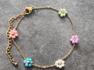 Nyt smukt Daisy armbånd, 18 karat guldbelagt 