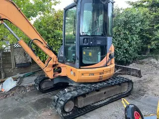 Gravemaskine Case CX50B