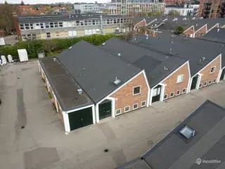 Nyrenoveret andel med gulvvarme – ideel til kombineret bolig og erhverv i Håndværkerbyen