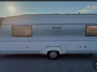 Søger campingvogn til midlertidig bolig