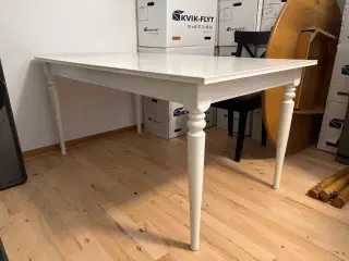 Hvidt spisebord med udtræk 150/215x87 cm
