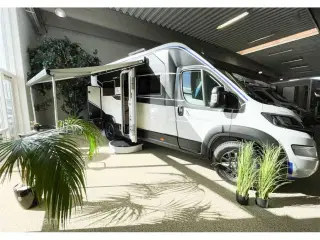 2024 - Chausson X650 Exclusive line   Flot innovativ cross-over model! Camper med stor Lounge og siddegruppe, sænkeseng, stor garage, Connect-, Artic- og X-tilbehørspakke,