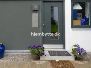Hjembytte - JensWarmingsVej
