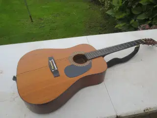 1 stk Guitar med Lædertaske