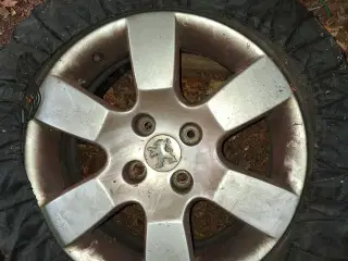 4 brugte alufælge med. dæk 