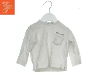 Langærmet bluse med lomme fra Zara (str. 74)