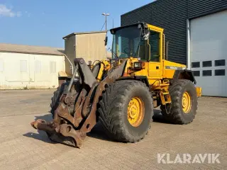 Gummiged Volvo L90C