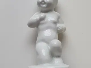 Hvid porcelænsfigur barn på knæ