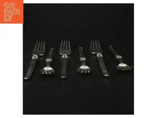 Sølvfarvede kagegafler