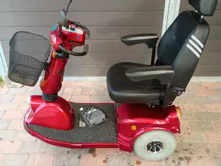 Velkørende elscooter.