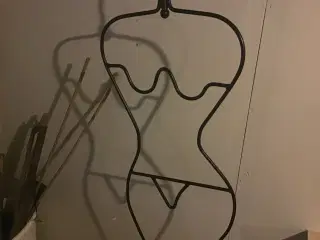Figur af kvinde.