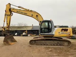 New Holland E 265 LC Kipbart planerblad og graveskovl