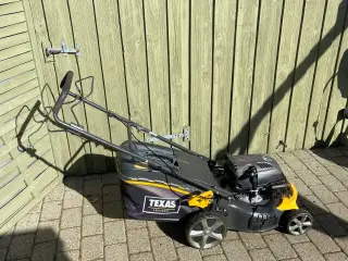 Texas benzin plæneklipper med Fremtræk og Opsamler