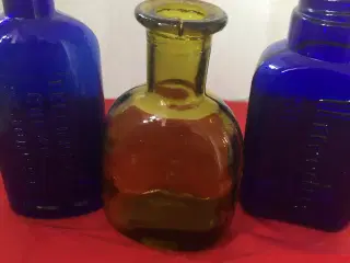 3 små flasker