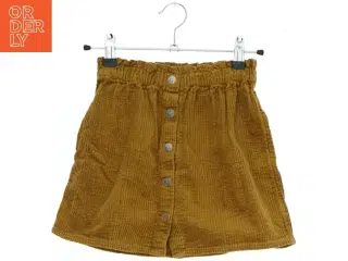 Brun fløjl nederdel med knapper fra H&M (str. 98)