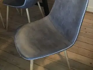 8 stole i grå med syninger og lyse ben