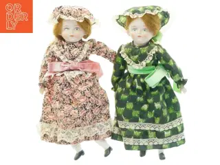 Porcelænsdukker med blomstrede kjoler (str. 30x12 cm)