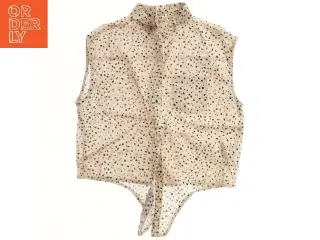 Prikket ærmeløs skjorte fra H&M (str. 146)