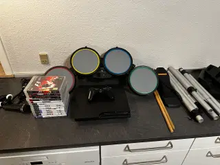 Playstation 3 med 12 spil og trommesæt