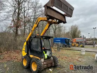 MF 516 Skid Loader