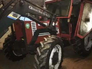 Søger traktor med frontlæsser. M/m
