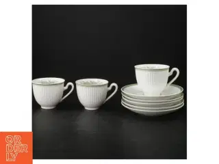 Grøn Melodi Porcelænskopper og -underkopper Grøn Melodi  fra Royal Copenhagen (str. Ø. 14 cm. ø. 8 cm)
