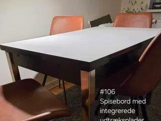 Spisebord med hvid plade og blanke ben