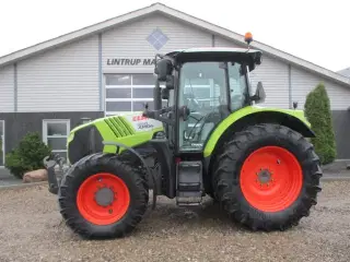 CLAAS ARION 550 C-matic med frontlift, affjedret foraksel og affjedret kabine.