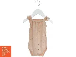 Lyserød bodystocking med triangulært mønster fra Petit (str. 74)