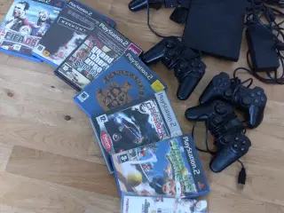 PlayStation 2 slim med controllers og diverse tilb