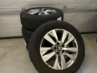 17" alufælge med næsten nye vinterdæk